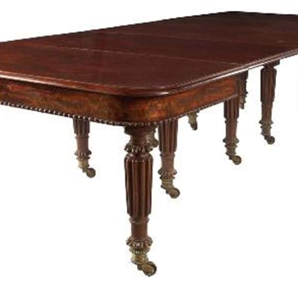 Dining table sells for £20,000 after missing piece found under mattress Image